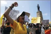  ?? ERANGA JAYAWARDEN­A — THE ASSOCIATED PRESS ?? Sri Lankans protest demanding president Gotabaya Rajapaksa resign in Colombo, Sri Lanka.