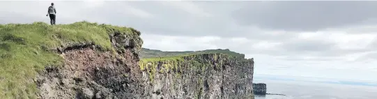  ??  ?? The Látrabjarg cliffs, Iceland’s westernmos­t point, offer vast coastline views and are home to millions of birds, including puffins, northern gannets, guillemots and razorbills.