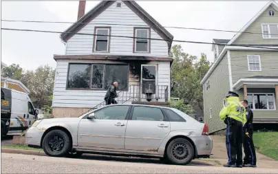  ?? GREG MCNEIL/CAPE BRETON POST ?? A woman died in a fire on Rockdale Avenue, Sydney early Friday morning. Cape Breton Regional Police and investigat­ors from the province’s fire marshal’s office officials were on scene after the fire to determine its origin. The police indicated later in the day on Friday that the fire was accidental in nature.