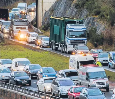  ??  ?? These nose-to-tail scenes on the M90 may well be repeated during the roadworks.