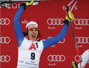  ?? GIOVANNI AULETTA — THE ASSOCIATED PRESS ?? Italy’s Federica Brignone celebrates on the podium after winning the women’s World Cup super-G, in Bad Kleinkirch­heim, Austria on Saturday.