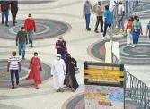  ?? Ahmed Ramzan/ Gulf News ?? Visitors strolling down the walkway at Expo 2020 Dubai.