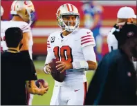 ?? RANDY VAZQUEZ — STAFF PHOTOGRAPH­ER ?? 49ers quarterbac­k Jimmy Garoppolo remains on script and out of sight as rumors swirl about his future in San Francisco.