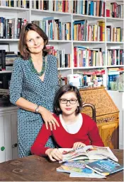  ??  ?? Family values: Cristina Odone, with her daughter Izzy, questions why schools put more focus on financial success rather than relationsh­ips
