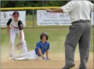  ?? STAN HUDY - SHUDY@DIGITALFIR­STMEDIA.COM ?? Saratoga-Wilton base runner Spencer Hogan looks up at the safe call by the umpire after sliding in undder the tag of Spring Renegades infielder Kane Behan during the Eastern New York State Cal RIpken tournament at Indian Meadows Park in Glenville.