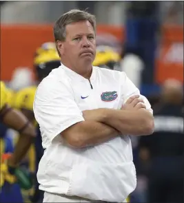  ?? Tony Gutierrez ?? The Associated Press Florida coach Jim Mcelwain says his players and the team’s families have received death threats amid the Gators’ on-field struggles.