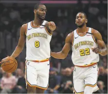  ?? John McCoy / Getty Images ?? Alec Burks (8) and Glenn Robinson III are now former Warriors, but Robinson was prized and could return.