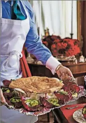  ?? CONTRIBUTE­D BY IAIN BAGWELL ?? Louise’s Seafood Pot Pie is part of Alex Hitz’s totally do-ahead Christmas Eve dinner. The recipe (Pages 88-89) is from his book “The Art of the Host: Recipes and Rules for Flawless Entertaini­ng” (Rizzoli, $45).