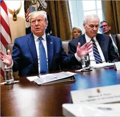  ?? DOUG MILLS / THE NEW YORK TIMES ?? The defense secretary Sunday fired Navy Secretary Richard Spencer (right), seen with President Trump at the White House in July, when Spencer was acting defense secretary.