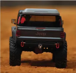  ??  ?? Axial’s Jeep JT Gladiator has a realistic look right out of the box.