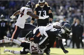  ?? MATT ROURKE — THE ASSOCIATED PRESS ?? Eagles running back Jordan Howard, seen here being tackled by Chicago’s Roquan Smith Nov. 3, didn’t practice Wednesday.