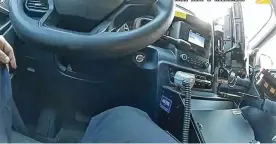  ?? AKRON POLICE DEPARTMENT ?? This screenshot of body-worn camera footage from an attempted traffic stop and brief car chase last year illustrate­s how little can be seen from the chest-mounted devices while officers remain in their vehicles.