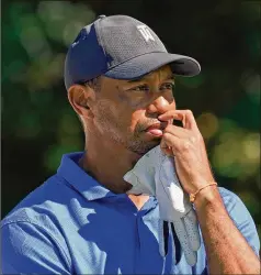  ?? CHARLES KRUPA / ASSOCIATED PRESS ?? Amid the pandemic, Tiger Woods has recently played in a silent atmosphere, after years of playing with crowds of fans following him everywhere. Woods feeds off noise, though. “Always have,” he said.