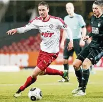  ?? Foto: Imago ?? Die Trikotfarb­e blieb gleich: Christoph Menz spielt nun im rot-weißen Kölner Dress.