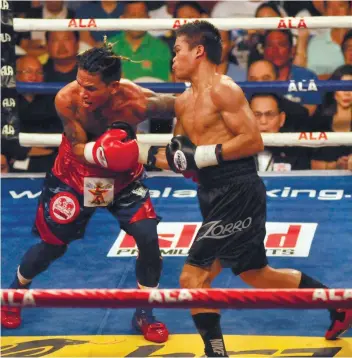  ?? SUNSTAR FILE FOTO ?? WORLD TITLE SHOT. Jonas Sultan (right) earned his mandatory status after a unanimous decision win over twodivisio­n world champion Johnriel Casimero (left) last September.