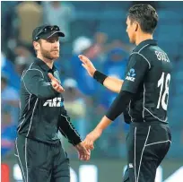  ?? Picture / Photosport ?? Trent Boult (right) was outstandin­g in game one, not yesterday, so captain Kane Williamson (left) must work to gee him up.