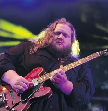  ?? KAYLE NEIS ?? The outdoor stage at the Bessboroug­h Gardens was the ideal venue for Matt Andersen to turn loose his powerful voice during his jazz festival performanc­e with the Bona Fide on Sunday night.