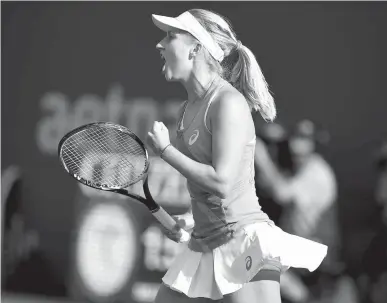  ?? Associated Press ?? n Daria Gavrilova of Australia reacts after winning a point during the third set against Dominika Cibulkova of Slovakia in the final match of the Connecticu­t Open tennis tournament Saturday in New Haven, Conn.