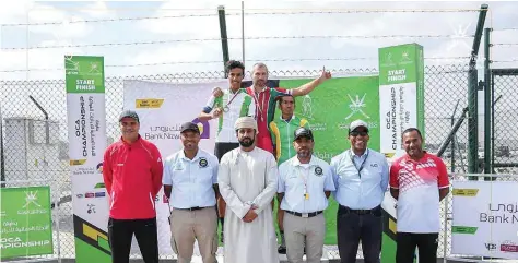  ??  ?? Pietruszka (centre) shares a podium with al Hsani (left) and Gelacio (right), earlier in the season, with OCA officials in front.