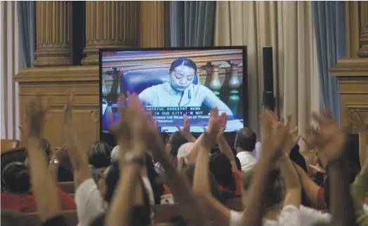  ?? Nathaniel Y. Downes / The Chronicle 2015 ?? The audience shows approval during Supervisor Malia Cohen's remarks about S.F.’s sanctuary city policies in 2015.