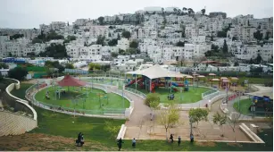  ?? ( Amir Cohen/ Reuters) ?? THE SETTLEMENT Regulation Law was design to save homes in communitie­s like the Modi’in Illit settlement in the West Bank.