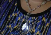  ?? PHOTOGRAPH­Y BY SHERYL NADLER, SPECIAL TO THE HAMILTON SPECTATOR ?? This teardrop pendant necklace and the matching earrings, not shown, were made by Thomas-Osbourne’s daughter, Avril Francis.