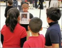  ?? TAWANA ROBERTS — THE NEWS-HERALD ?? Elm Street Elementary School fourth-grader Audrianna Bolin portrays Donna Link, a paraprofes­sional, during the African American Wax Museum on Feb. 27.