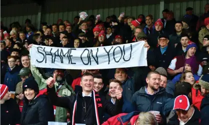  ??  ?? Gloucester fans waved money and displayed a banner when playing Saracens last weekend. Photograph: Simon Galloway/PA