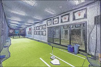  ?? Simply Vegas ?? Former Major League Baseball player Aaron Rowand built his 10,948-square-foot home with an indoor batting cage.