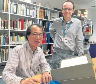  ?? Picture: Neil Henderson. ?? Professor Kazuhiro Kato, of Kagoshima Internatio­nal University, with Fife Council archivist Andrew Dowsey.