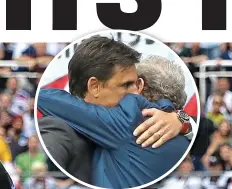  ?? PA ?? Hug: Coleman and Hodgson at full-time