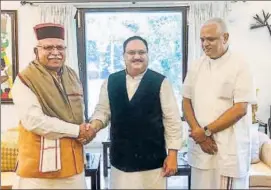  ??  ?? BJP working president JP Nadda with Haryana chief minister Manohar Lal Khattar and party's organising secretary BL Santosh in New Delhi on Friday.
PTI