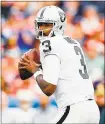  ?? JUSTIN EDMONDS — GETTY IMAGES ?? Raiders quarterbac­k EJ Manuel stepped in for injured Derek Carr against the Broncos. He finished 11 of 17 for 106 yards, with an intercepti­on.