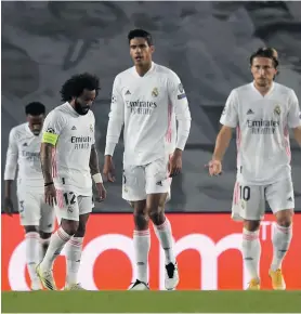  ??  ?? Real Madrid players look dejected after conceding a third goal during the UEFA Champions League Group B stage match between Real Madrid and Shakhtar Donetsk. Photo: Getty Images