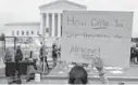  ?? ALEX BRANDON/AP ?? Demonstrat­ors protest outside of the U.S. Supreme Court on Thursday in Washington. A draft opinion suggests the U.S. Supreme Court could be poised to overturn the landmark 1973 Roe v. Wade case that legalized abortion nationwide, according to a Politico report released May 2.