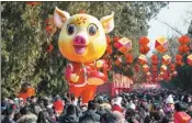  ?? SU YANG / FOR CHINA DAILY ?? A crowd celebrates the Lunar New Year at a fair in Beijing on Friday.