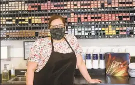  ?? Melanie Mason Los Angeles Times ?? WISCONSIN I S I N the throes of an outbreak. Business has rebounded at Salon La Rousse, but owner Tamara Ybarra remains worried about the pandemic.