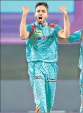  ?? BCCI ?? Lucknow Super Giants pacer Avesh Khan celebrates the wicket of Andre Russell on Saturday. He claimed three scalps.