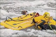  ?? ?? David Gilman / Gardiner Fire and Rescue
A dog had gotten stuck in the Wallkill River 30 feet from shore before being rescued by volunteers from Gardiner Fire and Rescue.
