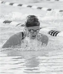  ?? GARY CURRERI FILE PHOTO ?? Princeton-bound Jennifer Secrest powers her way to a victory for Oxbridge Academy at the 1A swimming and diving championsh­ips.