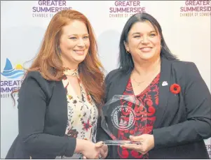  ?? COLIN MACLEAN/JOURNAL PIONEER ?? Katie Fraser, left, accepts the Greater Summerside Chamber of Commerce business excellence award (1 to 10 employees) from Stacy MacWilliam­s of West Isle Enterprise­s, which sponsored the award.
