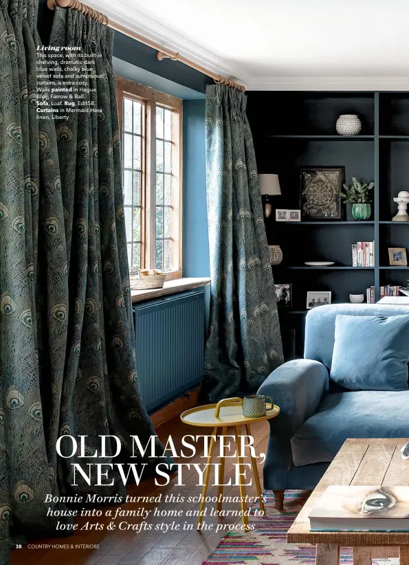  ??  ?? Living room
This space, with its built-in shelving, dramatic dark blue walls, chalky blue velvet sofa and sumptuous curtains, is extra cosy.
Walls painted in Hague Blue, Farrow & Ball.
Sofa, Loaf. Rug, Edit58.
Curtains in Mermaid Hera linen, Liberty