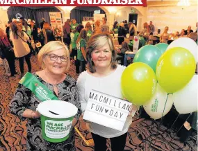  ??  ?? Fundraisin­g Irene Wilmot is pictured with Jan Forrest of Macmillan