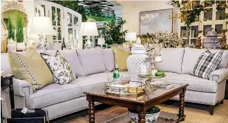  ?? Tribune News Service ?? ■ If you want a sofa that’s more comfortabl­e and casual, you might prefer a loose-back sofa that’s covered with cushions or pillows.