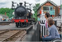  ?? VISITBRITA­IN/PETER KINDERSLEY ?? Enthralled spectators watch the North Eastern Locomotive Preservati­on Group’s J27 0-6-0 No. 65894 depart from Grosmont. The National Portfolio Organisati­on grant will boost the North Yorkshire Moors Railway’s programme to remove barriers to travel for people with special needs.