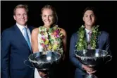  ??  ?? With 2014 WSL champions Stephanie Gilmore
(center) and Gabriel Medina (right), 2015