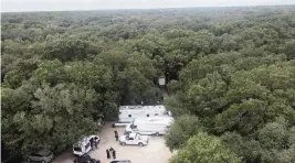  ?? North Port Police Department via AP ?? Police search the vast Carlton Reserve in the Sarasota, on Saturday for Brian Laundrie, considered a person of interest in the disappeara­nce of his girlfriend, Gabrielle Petito.