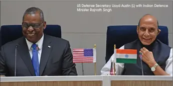  ?? US Defense Secretary Lloyd Austin (L) with Indian Defence Minister Rajnath Singh ??