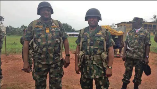  ??  ?? The winning team_ Commodore Patrick Yekwe, the Commander, NNS Wey (L) and the Flag Officer Commanding, Naval Training Command, Rear Admiral Obi Ofodile