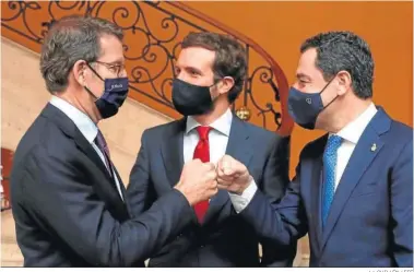  ?? J.J. GUILLÉN / EFE ?? El presidente de la Junta, Juanma Moreno, con Alberto Núñez Feijóo y Pablo Casado, ayer en Madrid.